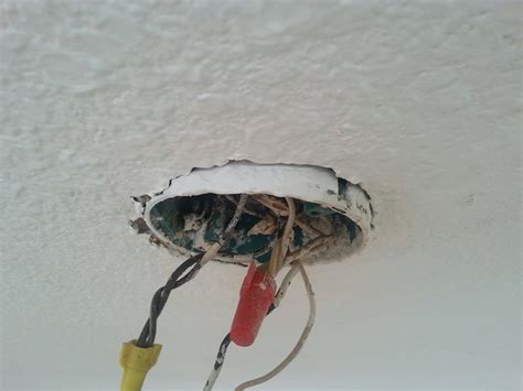 how to replace a ceiling fan electrical box|removing electrical box from ceiling.